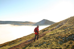 Walker climbing Pen y Fan