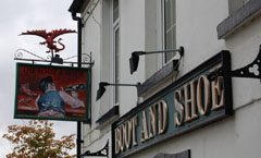 The sign at the Boot and Shoe public house, Kidwelly.