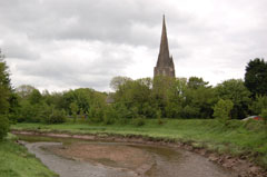 The spire of Kidwelly Parish Church and the River Gwendraeth