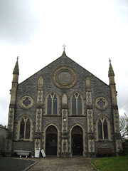 A Chapel with a couple of baths and a sink